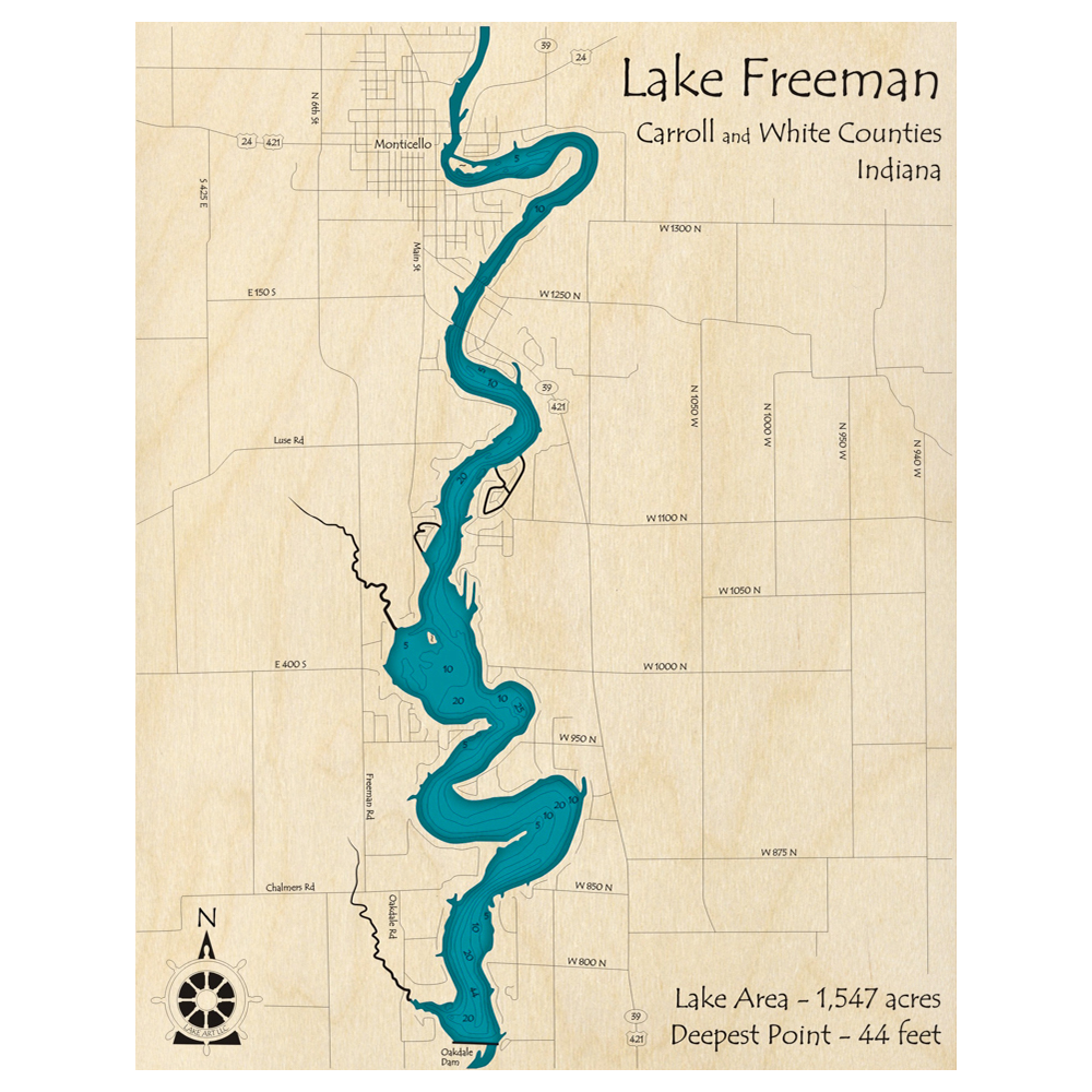 Bathymetric topo map of Lake Freeman, IN with roads, towns and depths noted in blue water.
