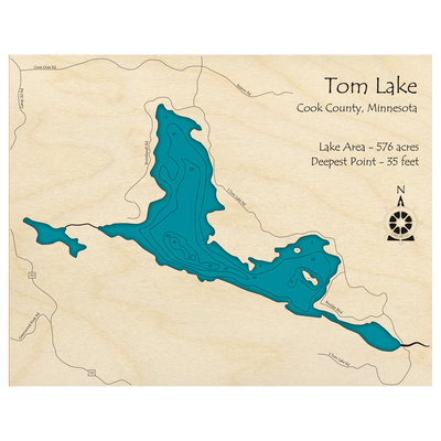 Bathymetric topo map of Tom Lake, MN with roads, towns and depths noted in blue water.